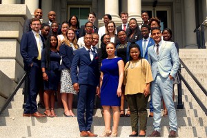 The SAWIP Team, Management and Advisory Council Member on the stairs of the Executive Building.